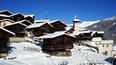 Zoek geweldige sneeuw en een mooi dorp in Grimentz